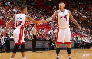 Shabazz Napier and Chris Andersen of the Miami Heat