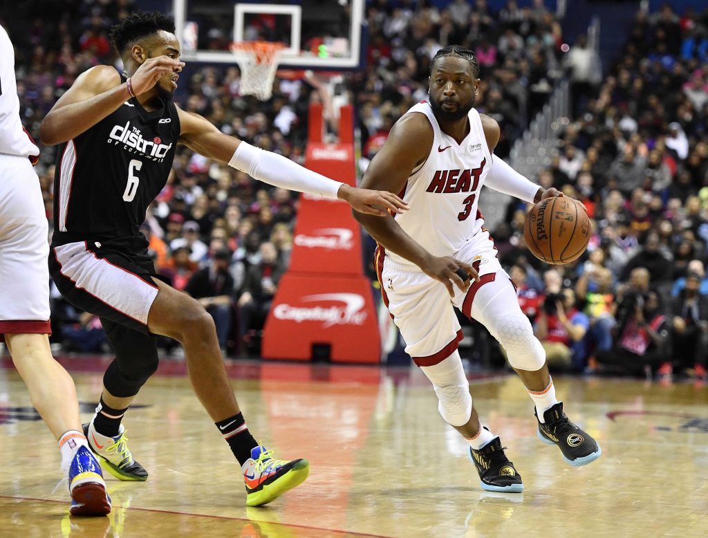 Dwyane Wade and Troy Brown Jr.