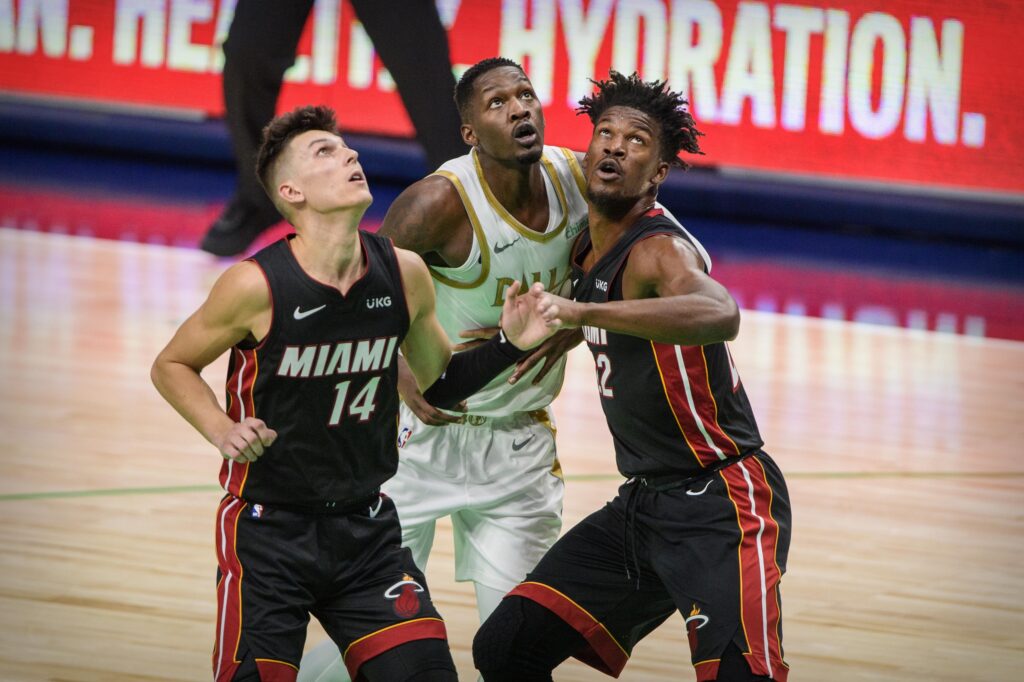 Tyler Herro, Jimmy Butler and Dorian Finney-Smith