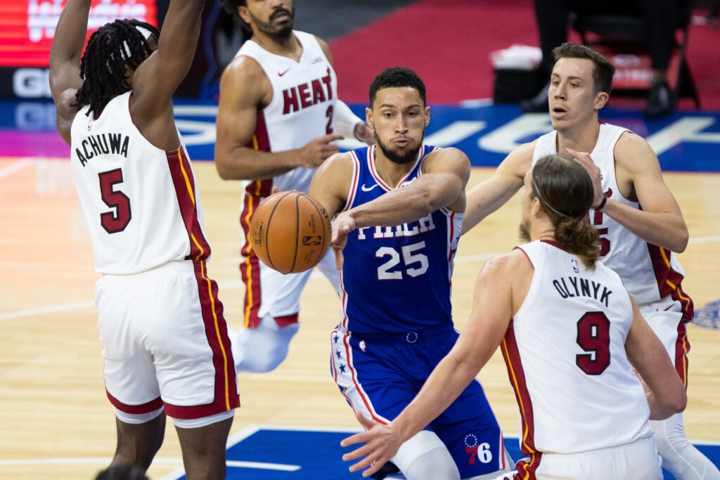 Precious Achiuwa, Duncan Robinson and Kelly Olynyk