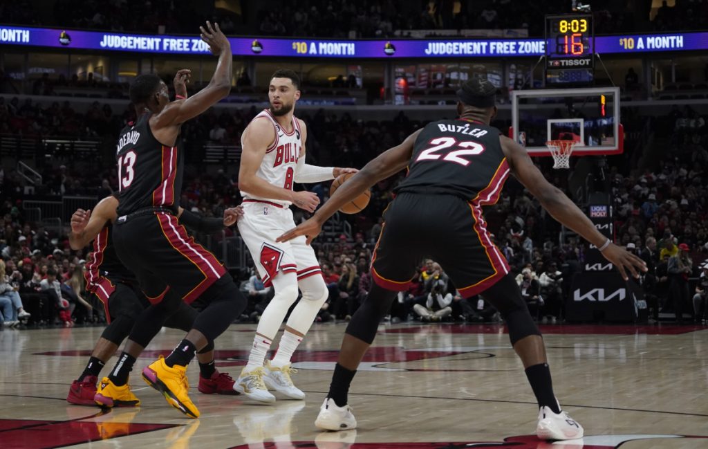 Zach LaVine, Bam Adebayo and Jimmy Butler